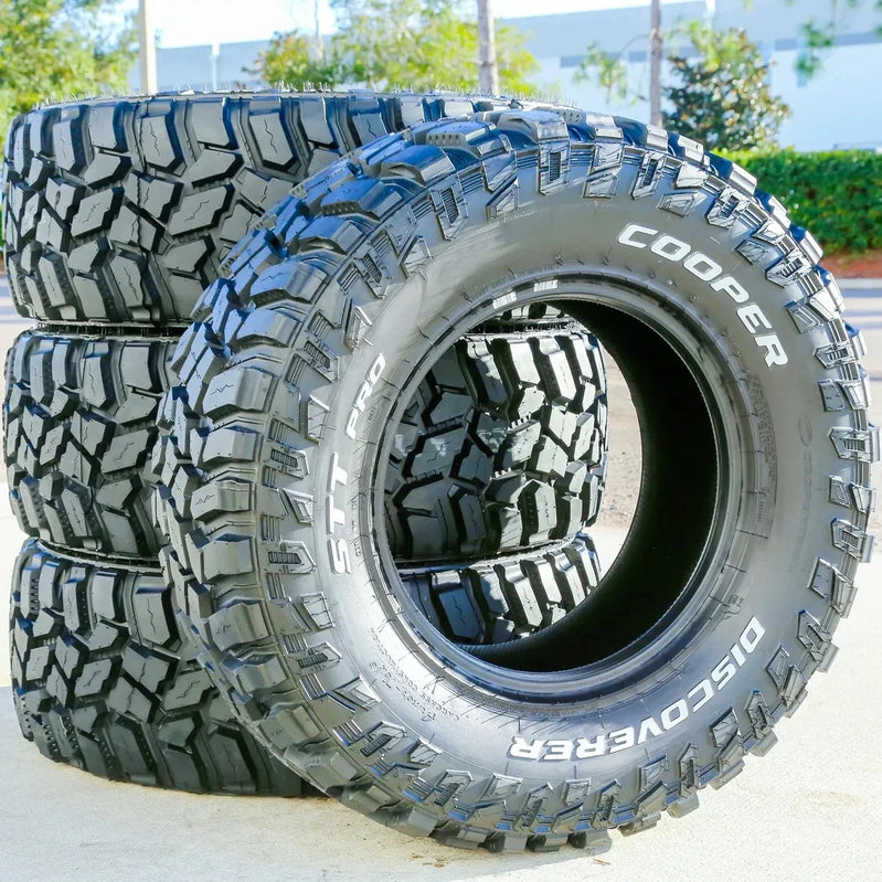 Set Of 4, Four Cooper Discoverer Stt Pro Lt 275/70R18 125/122P E 10 Ply Mt M/T Mud Tires